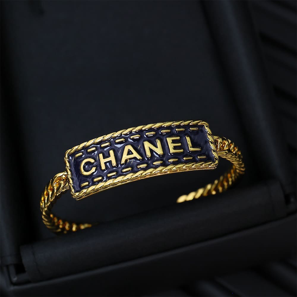 Ch**el Wide Gold Metal Bracelet